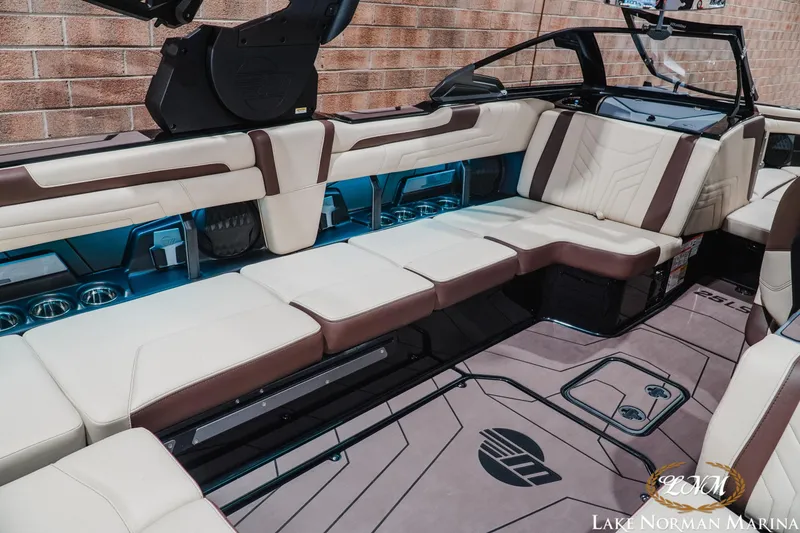 Slide: The Image of Luxurious interior of 2027 Malibu Wakesetter 25 LSV boat with plush seating and modern design. - 16