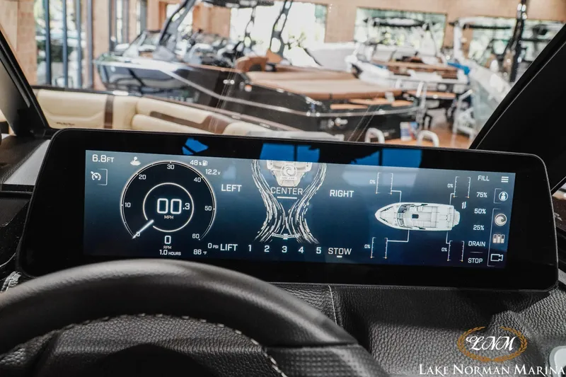 Slide: The Image of Dashboard display of 2027 Malibu Wakesetter 25 LSV boat at Lake Norman Marina. - 33