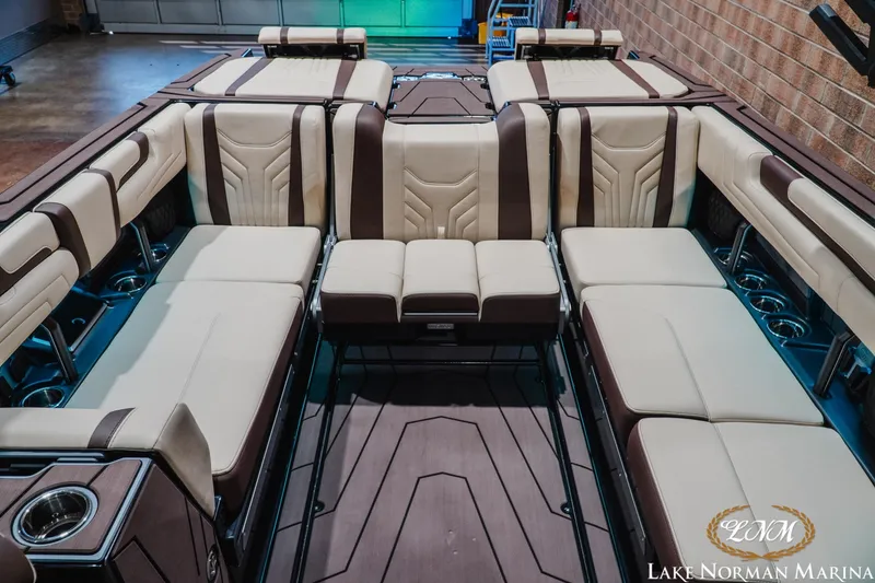 Slide: The Image of Luxurious interior of 2027 Malibu Wakesetter 25 LSV boat with plush seating. - 26