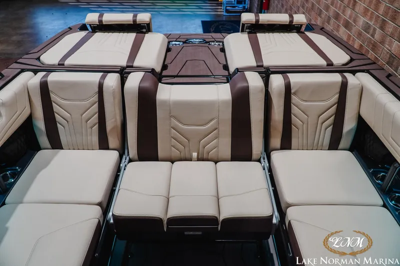 Slide: The Image of Luxurious interior seating of 2027 Malibu Wakesetter 25 LSV boat at Lake Norman Marina. - 28