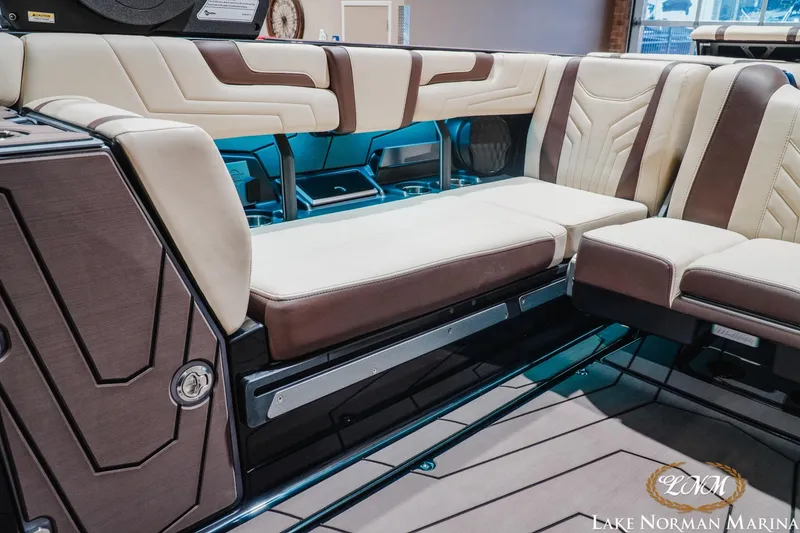 Slide: The Image of Luxurious interior seating of 2027 Malibu Wakesetter 25 LSV boat at Lake Norman Marina. - 27