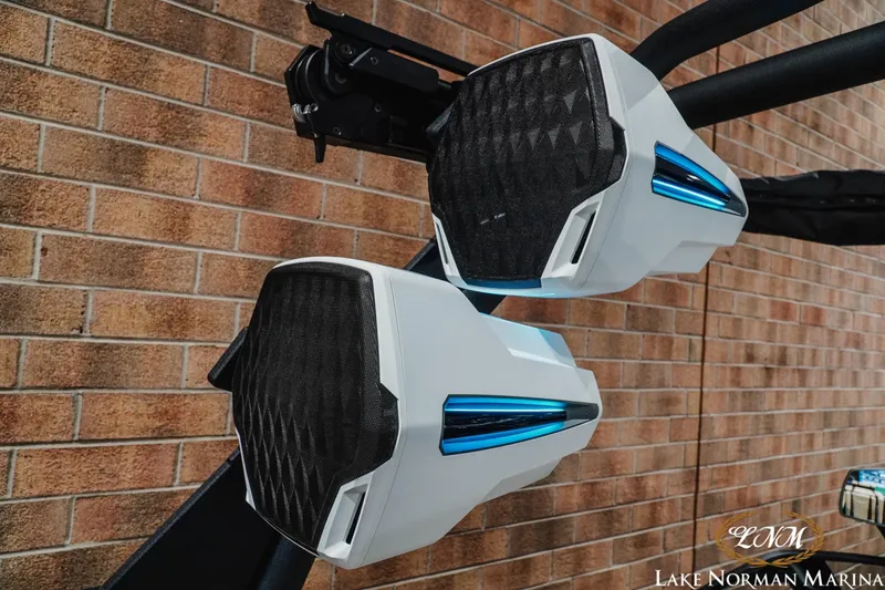 Slide: The Image of 2027 Malibu Wakesetter 25 LSV speakers with sleek design at Lake Norman Marina. - 30