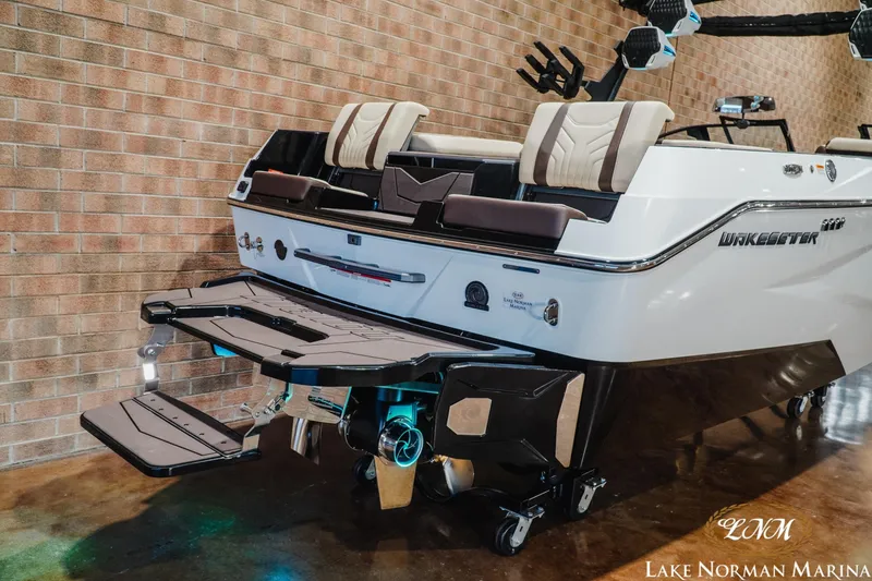 Slide: The Image of 2027 Malibu Wakesetter 25 LSV boat with sleek design at Lake Norman Marina. - 6