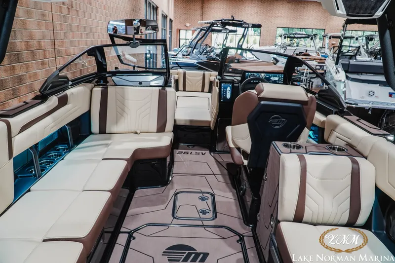 Slide: The Image of Interior of 2027 Malibu Wakesetter 25 LSV boat with luxurious seating. - 13