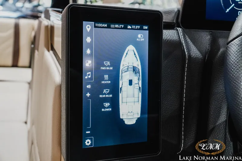 Slide: The Image of Touchscreen control panel in 2027 Malibu Wakesetter 25 LSV boat, displaying navigation and system settings. - 32