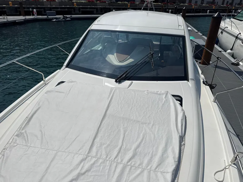 Slide: The Image of The 2020 Beneteau Gran Turismo 40 is docked. It features a modern design with a large sun deck. - 28