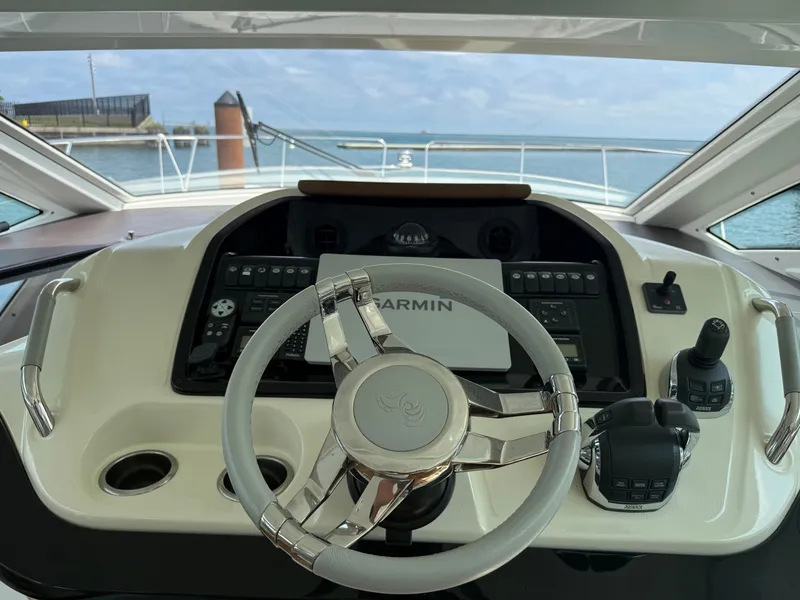 Slide: The Image of The image shows the helm of a 2020 Beneteau Gran Turismo 40. - 17