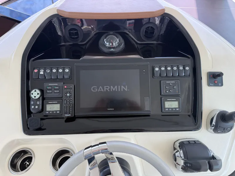 Slide: The Image of The image shows the helm of a 2020 Beneteau Gran Turismo 40 with Garmin navigation. - 18