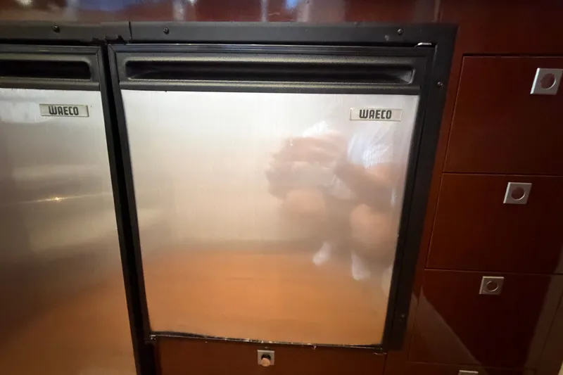 Slide: The Image of Waeco fridge in 2010 Sea Ray 390 Sedan Bridge yacht interior. - 67