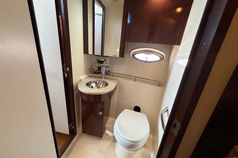 Slide: The Image of Luxurious bathroom in 2010 Sea Ray 390 Sedan Bridge yacht with modern fixtures. - 111