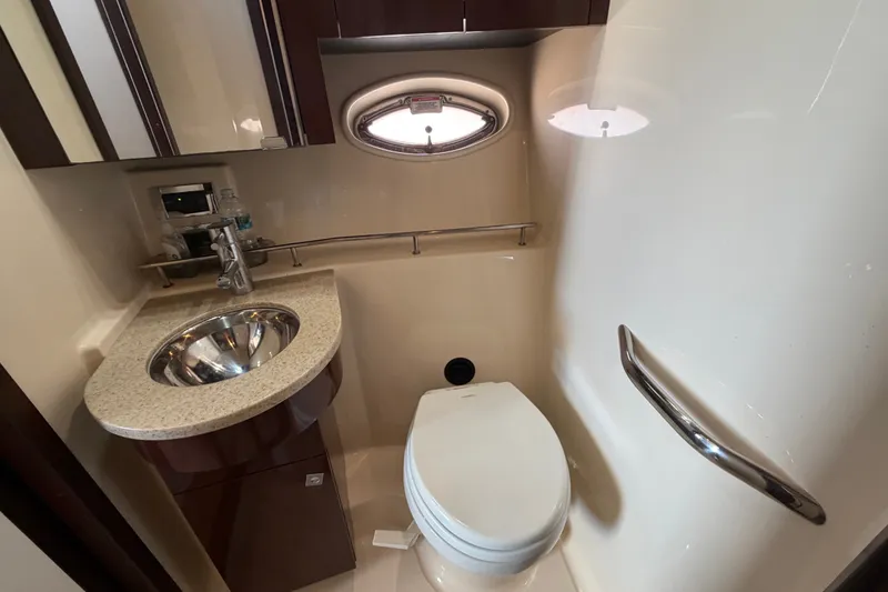 Slide: The Image of Luxurious bathroom in 2010 Sea Ray 390 Sedan Bridge yacht with modern fixtures. - 112