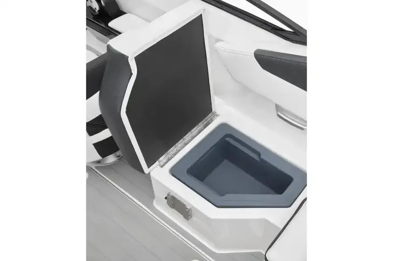Slide: The Image of Manufacturer Provided Image: 2027 Yamaha Boats AR205 storage compartment with open lid, showcasing interior space. - 3
