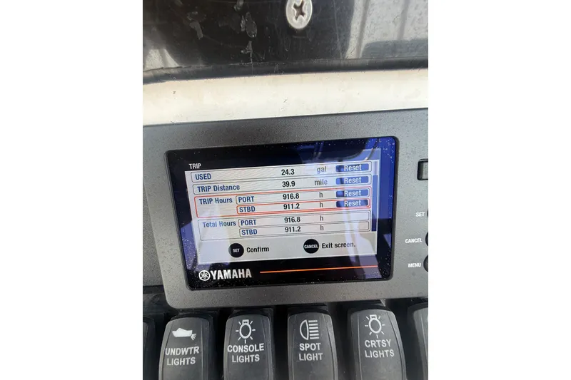 Slide: The Image of Yamaha display showing trip data on a 2006 Contender 27 Open boat. - 6