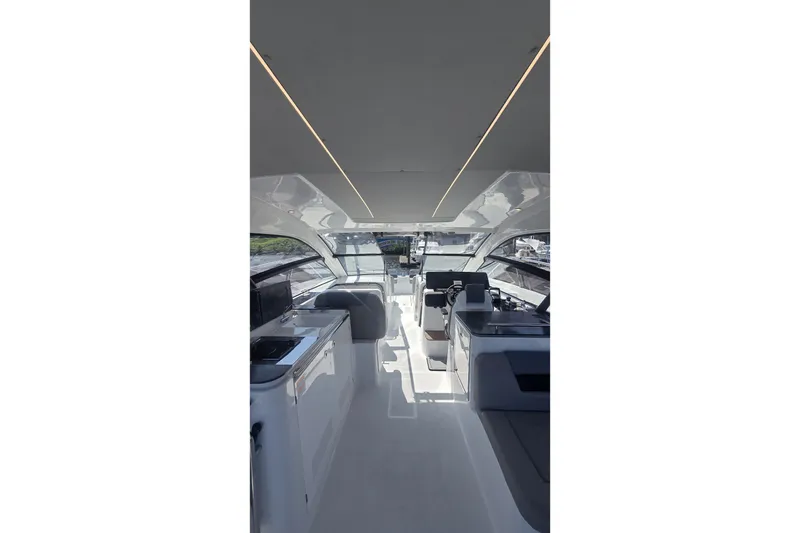 Slide: The Image of Interior of 2025 Four Winns TH36 yacht, featuring sleek design and modern amenities. - 4