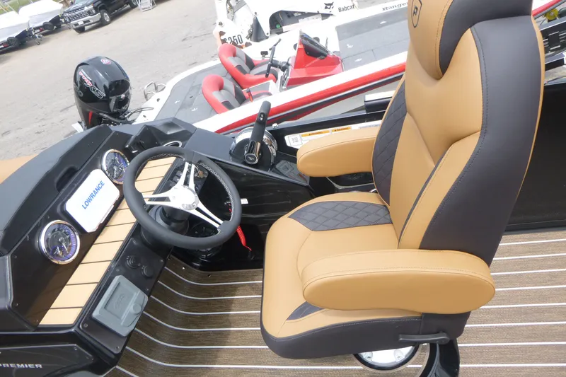 Slide: The Image of Luxurious interior of 2027 Premier 230 Sunsation RS - CL boat with tan and black seating. - 14
