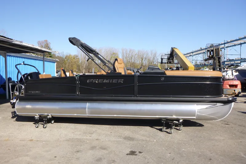 The Image of 2027 Premier 230 Sunsation RS - CL pontoon boat in a marina setting. - 0