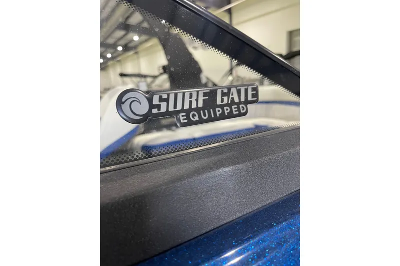Slide: The Image of 2015 Malibu Wakesetter 24 MXZ with Surf Gate Equipped sticker on window. - 11