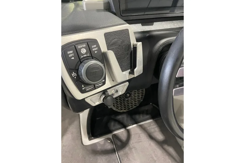 Slide: The Image of Control panel of a 2015 Malibu Wakesetter 24 MXZ boat dashboard. - 15