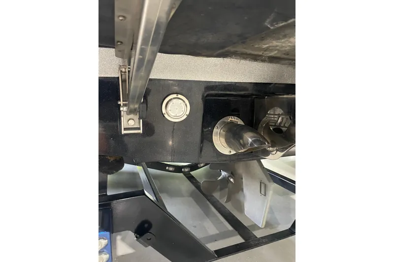 Slide: The Image of Close-up of 2015 Malibu Wakesetter 24 MXZ boat's propeller and underwater components. - 7