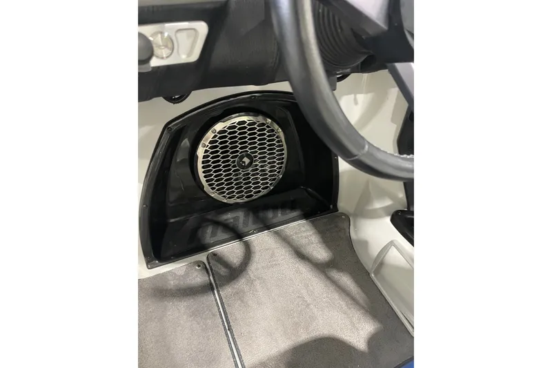 Slide: The Image of 2015 Malibu Wakesetter 24 MXZ interior with speaker and steering wheel detail. - 14