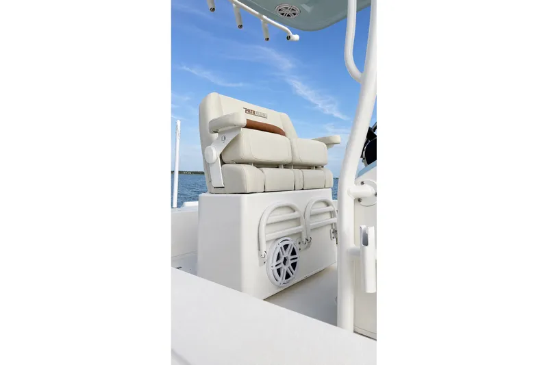 Slide: The Image of 2023 Pathfinder 2500 Hybrid boat seating with ocean backdrop. - 37
