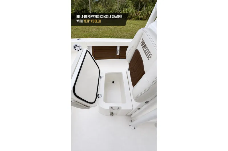 Slide: The Image of 2023 Pathfinder 2500 Hybrid boat with built-in forward console seating and Yeti cooler. - 41