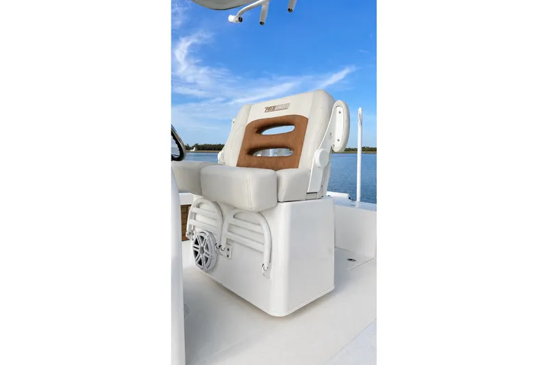 Slide: The Image of 2023 Pathfinder 2500 Hybrid boat seat with speaker, on calm water background. - 38