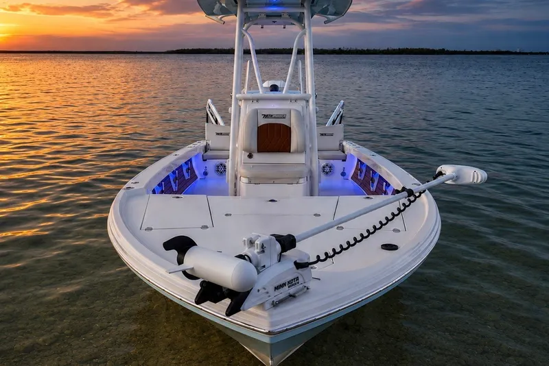 Slide: The Image of 2023 Pathfinder 2500 Hybrid boat on water at sunset, showcasing sleek design and advanced features. - 18