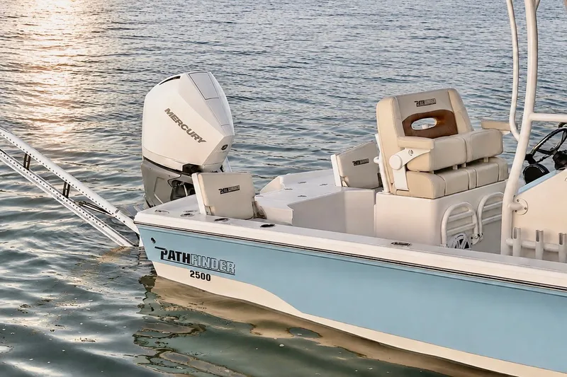 Slide: The Image of 2023 Pathfinder 2500 Hybrid boat with Mercury engine on calm water. - 6