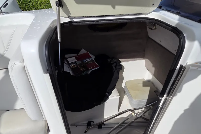 Slide: The Image of Storage compartment of a 2009 Ebbtide 2400 SS Fun Cruiser O/B boat. - 16