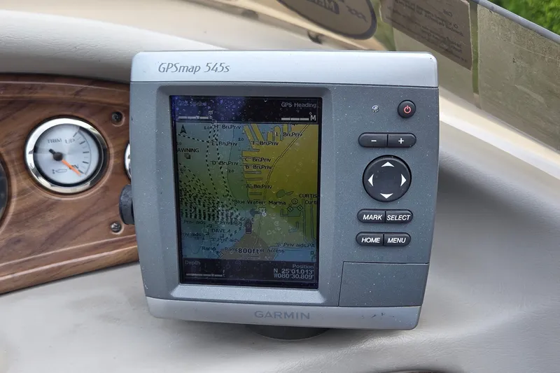 Slide: The Image of Garmin GPSmap 545s on 2009 Ebbtide 2400 SS Fun Cruiser dashboard. - 11