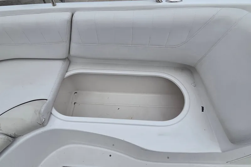 Slide: The Image of 2009 Ebbtide 2400 SS Fun Cruiser O/B boat seating with storage compartment. - 13