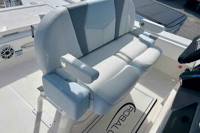 Slide: The Image of 2027 Robalo 266 Cayman boat seating with armrests, showcasing modern design and comfort. - 21