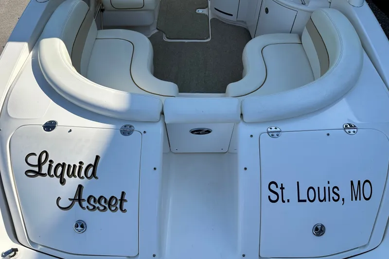 Slide: The Image of 2001 Sea Ray 290 Bowrider boat with "Liquid Asset" and "St. Louis, MO" text. - 6