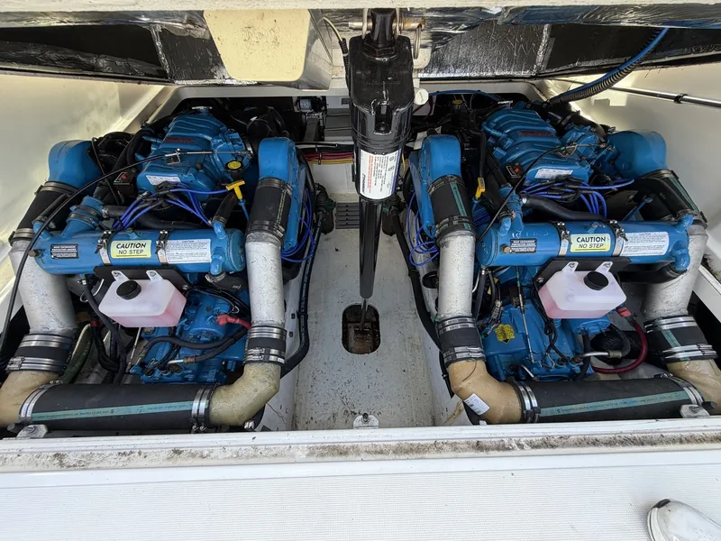 Slide: The Image of Two blue engines in the engine compartment of a 2000 Tiara Yachts 2900 Coronet. - 21