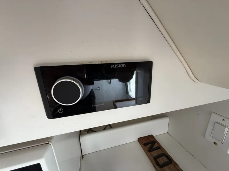 Slide: The Image of A Fusion audio system is installed in the interior wall of a 2000 Tiara Yachts 2900 Coronet. - 19