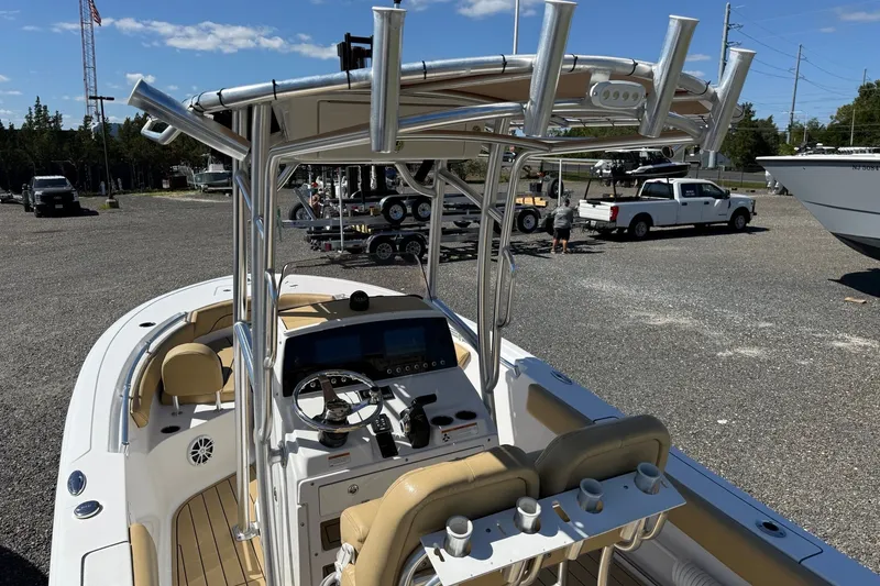 Slide: The Image of 2022 Sportsman Open 212 Center Console boat with T-top and dual seating. - 12