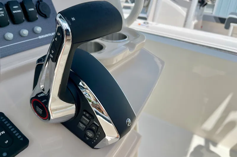 Slide: The Image of Throttle control of 2027 Boston Whaler 220 Dauntless boat, featuring modern design and functionality. - 20