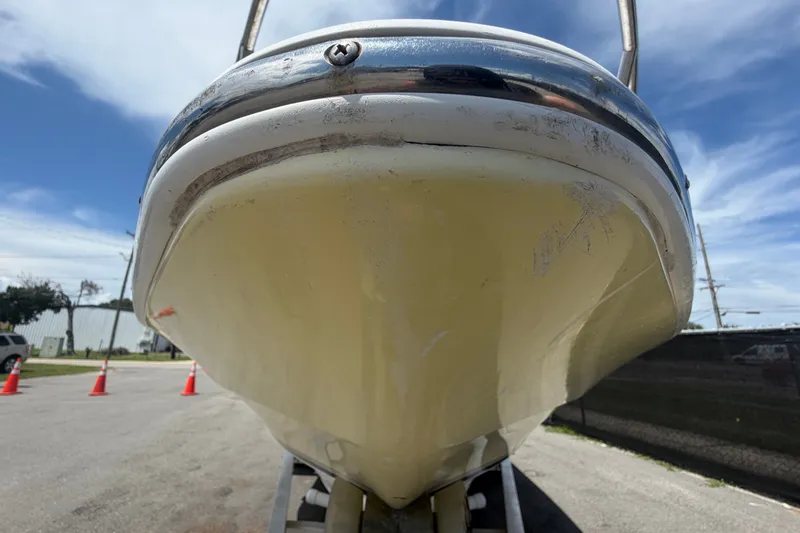 Slide: The Image of 2005 Sea Fox 197 Center Console boat, close-up view of hull, outdoors. - 8