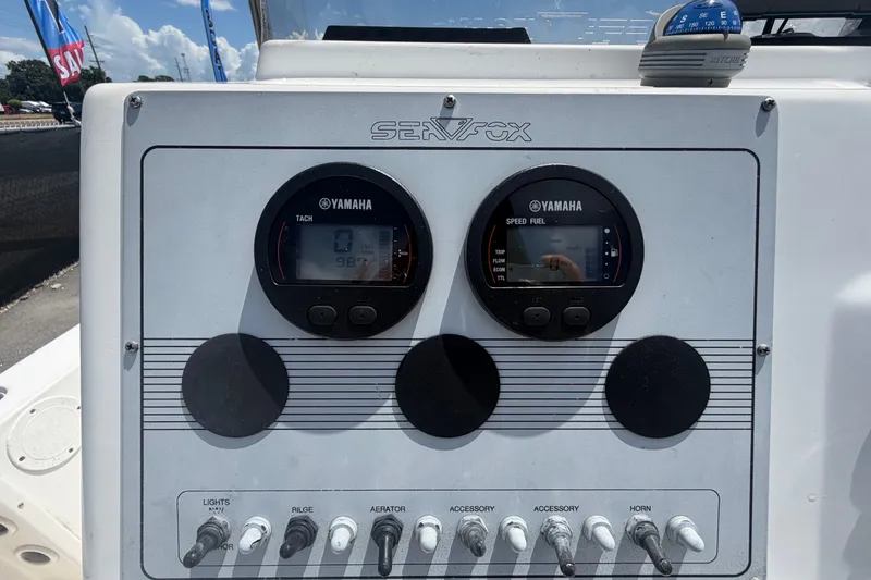 Slide: The Image of Control panel of a 2005 Sea Fox 197 Center Console boat with Yamaha gauges. - 18