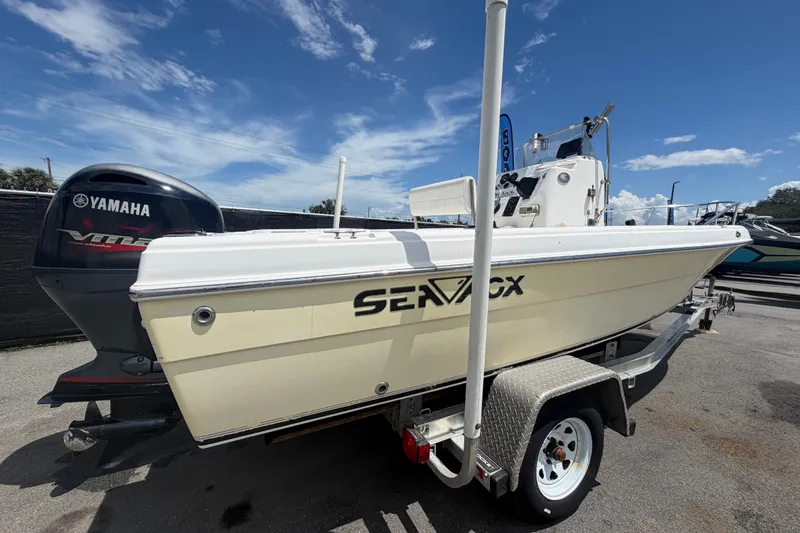 Slide: The Image of 2005 Sea Fox 197 Center Console boat on trailer with Yamaha outboard motor. - 2