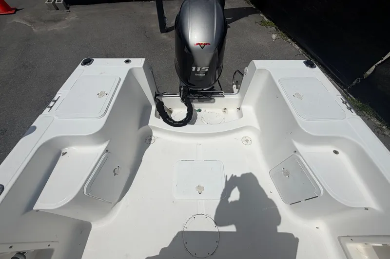 Slide: The Image of 2005 Sea Fox 197 Center Console boat interior with Yamaha 115 engine. - 38