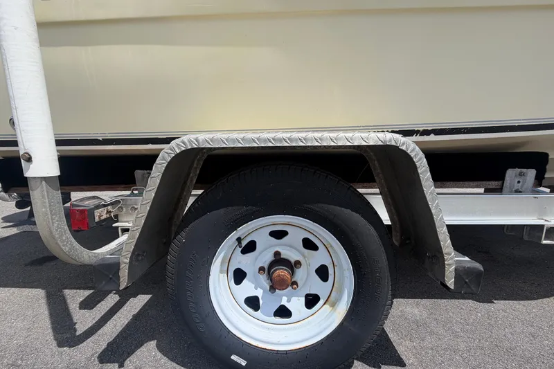 Slide: The Image of Trailer wheel of a 2005 Sea Fox 197 Center Console boat. - 56
