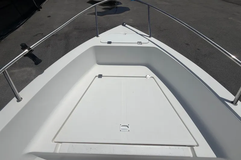 Slide: The Image of 2005 Sea Fox 197 Center Console boat deck with stainless steel railings. - 26