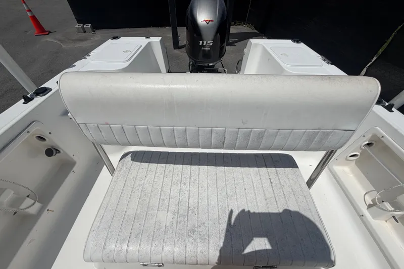 Slide: The Image of 2005 Sea Fox 197 Center Console boat interior with Yamaha 115 engine. - 36