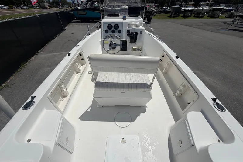 Slide: The Image of 2005 Sea Fox 197 Center Console boat interior with seating and steering console. - 10