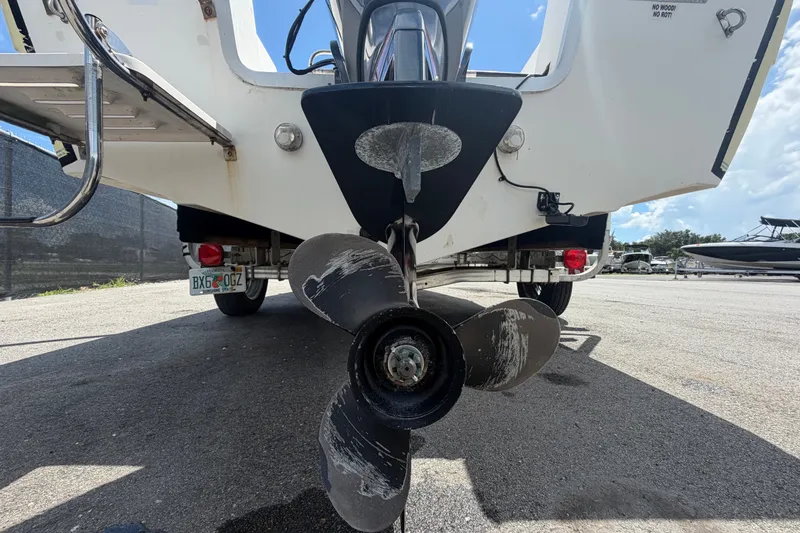 Slide: The Image of Rear view of a 2005 Sea Fox 197 Center Console boat with visible propeller. - 4