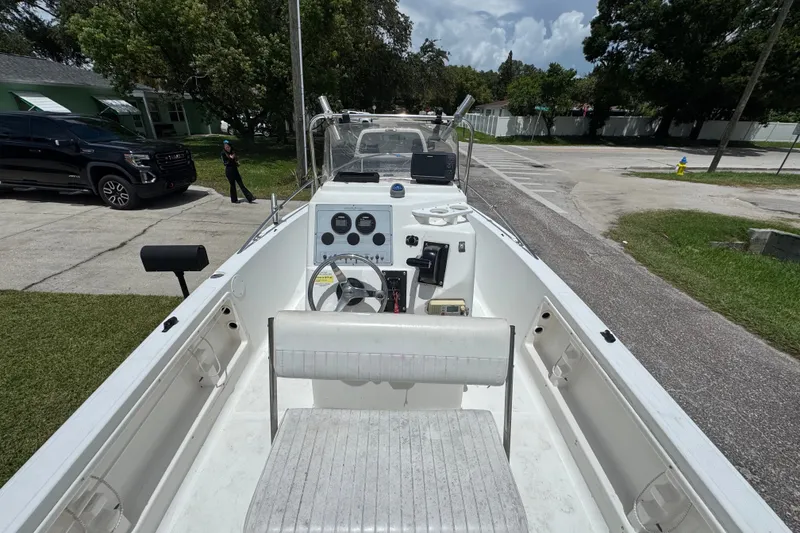 Slide: The Image of 2005 Sea Fox 197 Center Console boat parked on a residential street. - 5