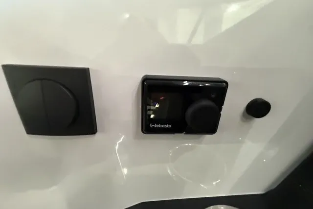 Slide: The Image of Control panel on 2025 Axopar 29 XC Cross Cabin boat interior. - 22