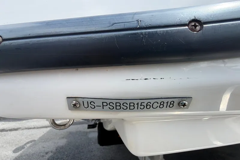 Slide: The Image of Close-up of a 2018 Scarab 195 G boat hull identification number plate. - 60